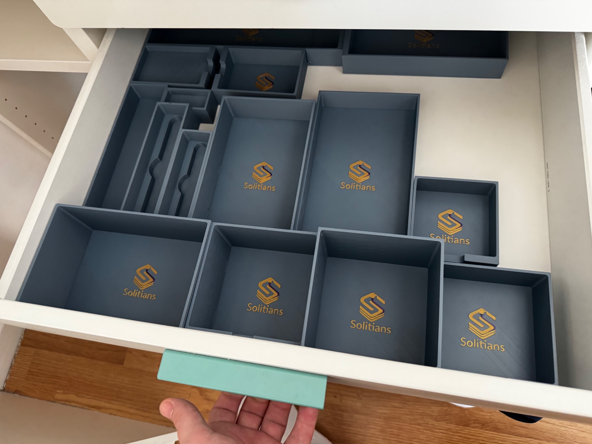 3D-geprinte Solitians lade-organizers met logo